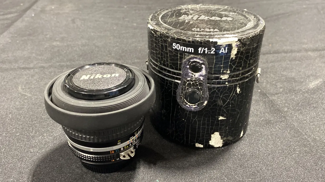 NIKON NIKKOR 50MM F/1.2 LENS WITH NIKON L37C 52MM SCREW-ON ULTRAVIOLET OPTICAL FILTER, NIKON HR-2