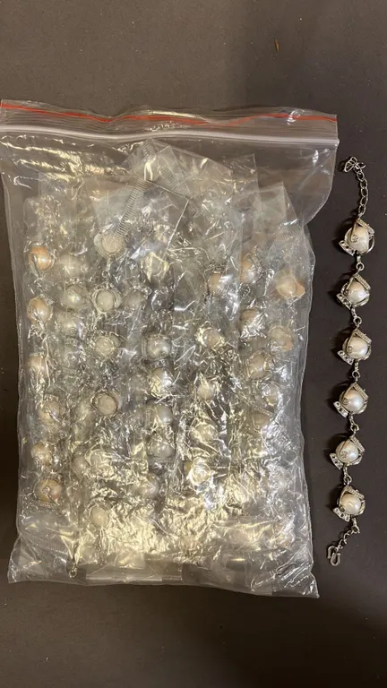 BAG OF (17) BAROQUE PEARL & STAINLESS STEEL BRACELETS