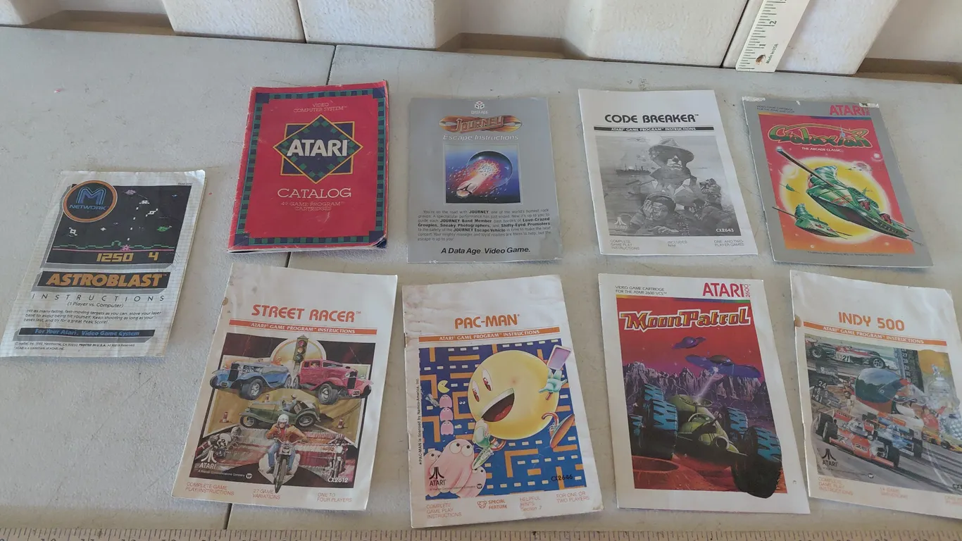 1980s Atari Booklets-Astroblast, Street Racer, Catalog, Pac-Man, Moon Patrol, Indy 500, Journey, Cod
