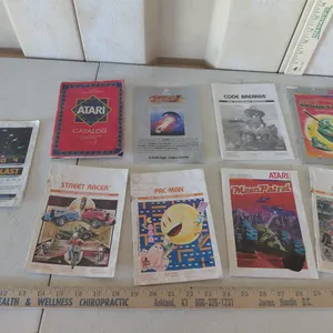 1980s Atari Booklets-Astroblast, Street Racer, Catalog, Pac-Man, Moon Patrol, Indy 500, Journey, Cod