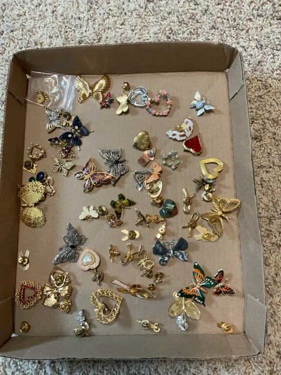 Pins mostly a butterflies and hearts
