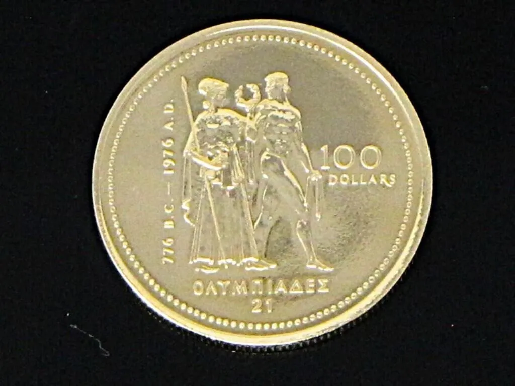 1976 MONTREAL OLYMPICS 14KT GOLD $100 COIN 13.28g