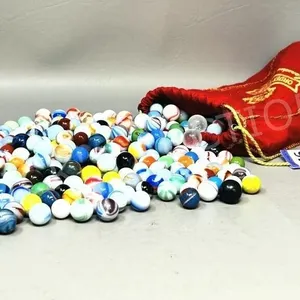 vintage marble collection in red fabric bag