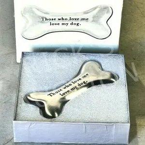 Sacchi metal dog bone paperweight -  5" long