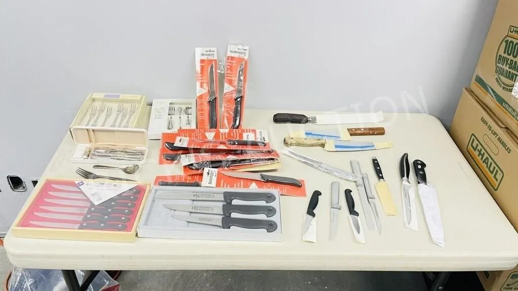 lot of assorted kitchen knives - some new & more