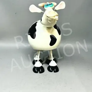ceramic spring leg cow - 10" tall