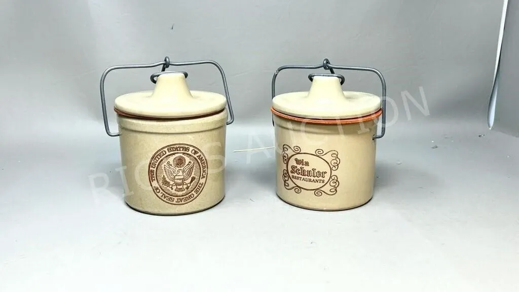 2 small stoneware cheese crocks w/ logos