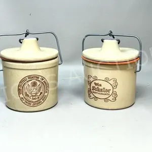 2 small stoneware cheese crocks w/ logos