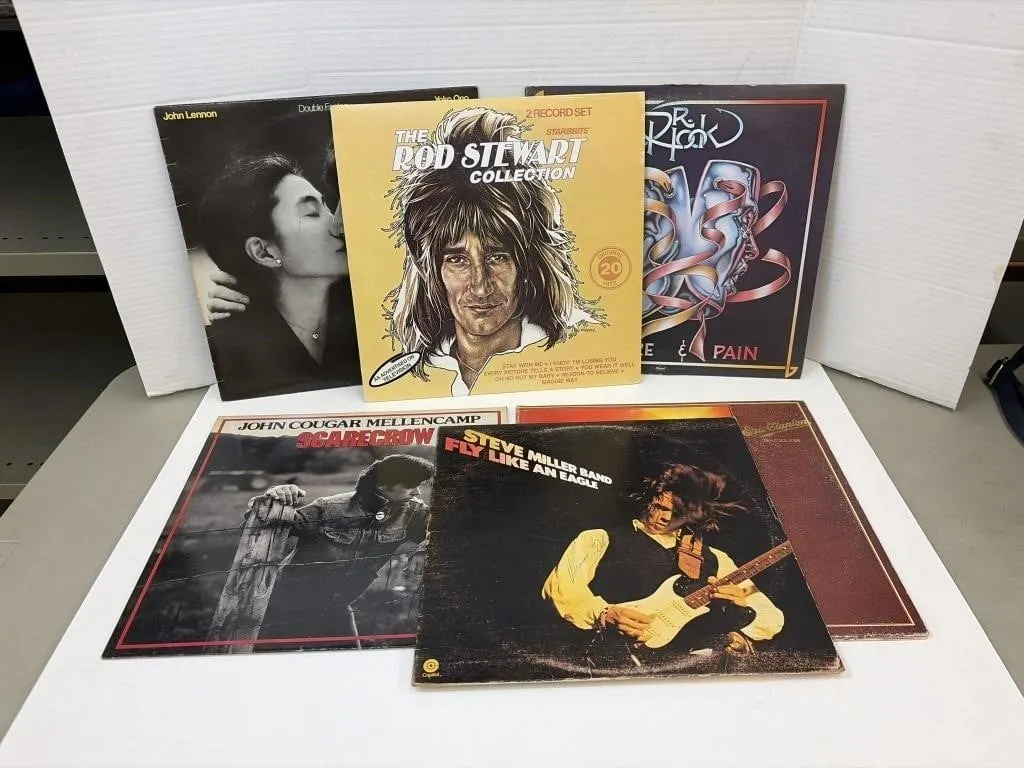 Records including artists like Rod Stewart, John