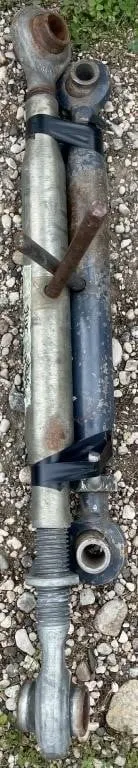 Two different three-point hitch top link