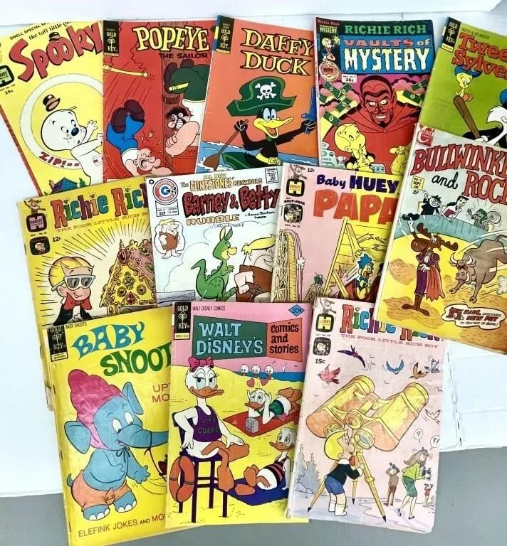 A dozen vintage comic books, mostly from the