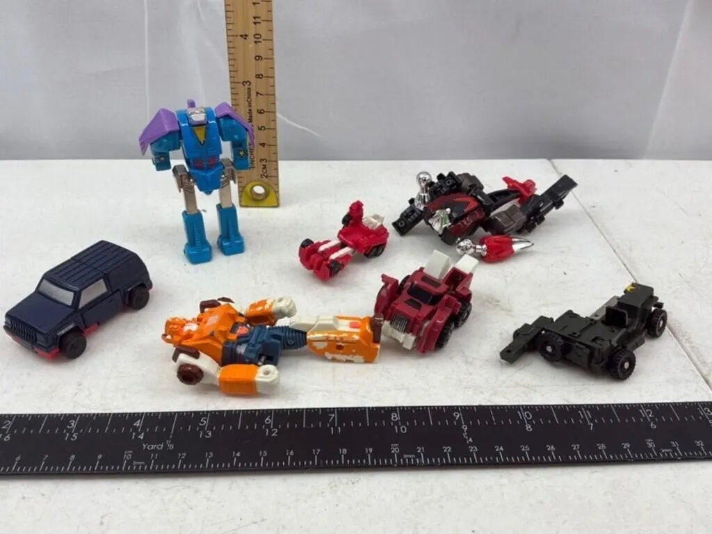 Mixed Toy Robots & Vehicles (7pc)