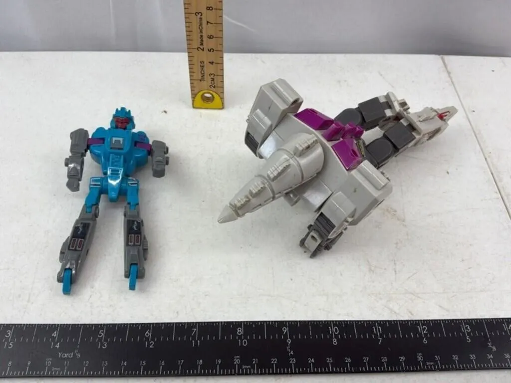 Vintage Transforming Robot Toys (Lot of 2)