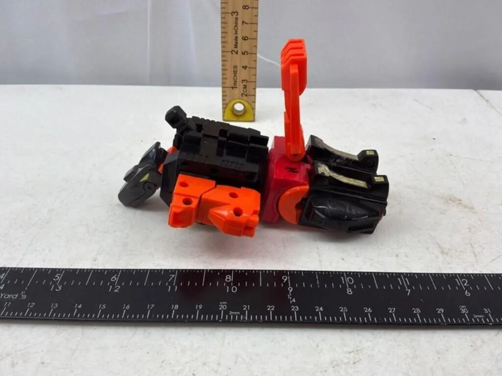 Articulated Orange & Black Toy Vehicle