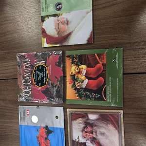 Royal Canadian Mint 1997 & 2008 Oh Canada Coins, 2004-2005 & 2008 Christmas Year Coin Sets in Folders
 UNRESERVED