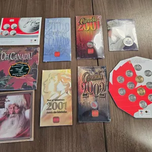 (9) Royal Canadian Mint Special Coins & Coin Sets in Folders
 UNRESERVED