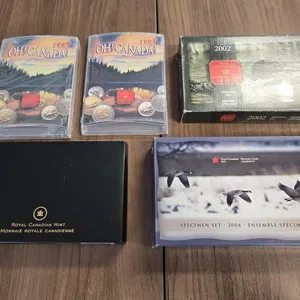 RCM 1998 & 2000 Oh Canada Coins & 2002, 2004 & 2007 Specimen Year Coin Sets
 UNRESERVED