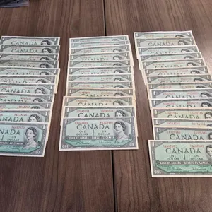 (37) 1954 Bank of Canada One Dollar Banknotes (16 Beattie/Rasminsky, 13 Bouey/Rasminsky, 4 Lawson/Bouey & 4 Beattie/Coyne)
 UNRESERVED