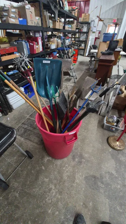 Assorted Garden and Yard Tools: Shovels, Rakes, Hoes, Cultivators, can