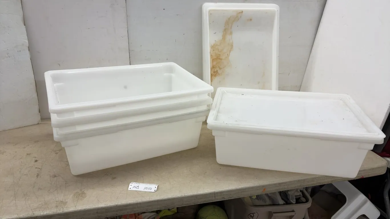 Four White Rectangular Plastic Storage Containers with Lids, 9 × 24 × 16”