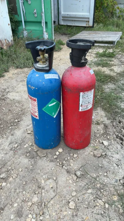 Two CO2 Carbon Dioxide Cylinders