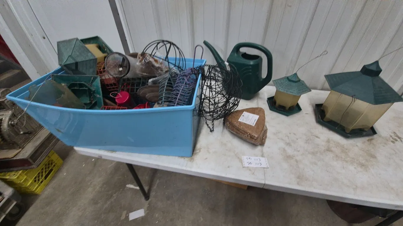 Assorted Bird Feeders, Watering Can, and Wire Baskets
