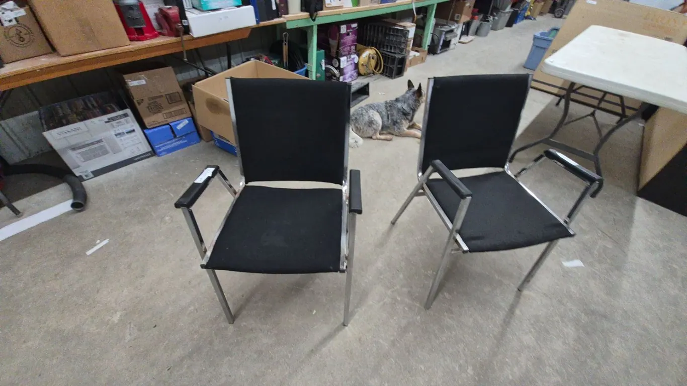 Two Black Fabric and Chrome Armchairs
