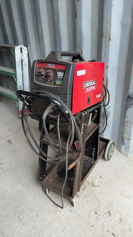 Lincoln Electric 180 MIG-PAK Welder, Cart, Gas Tank, Regulator, and Torch