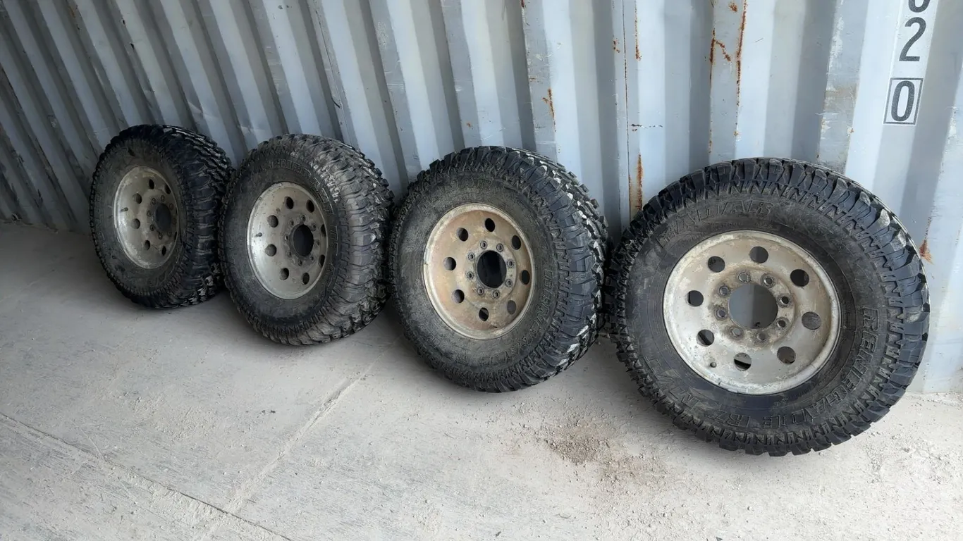 Four LT265/75R16 Renegade R7 M/T Tires on 16” 8-Lug Wheels (New/Never Used)