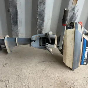 Evinrude 4 Outboard Motor with Propeller and Controls