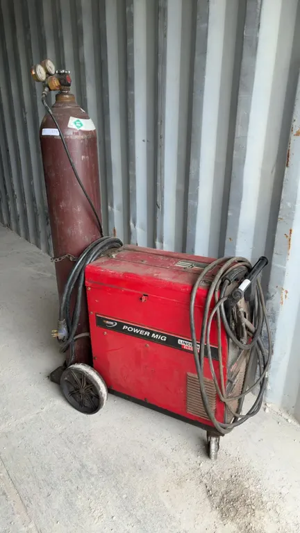 Lincoln Electric Power Mig 255 Welder, Argon/Carbon Dioxide Tank, and Regulator
