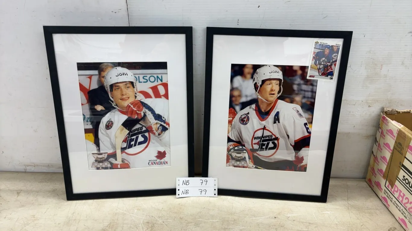 Two 13 × 17 Framed Winnipeg Jets Hockey Player Photos; Teemu Selanne and Phil Housley with