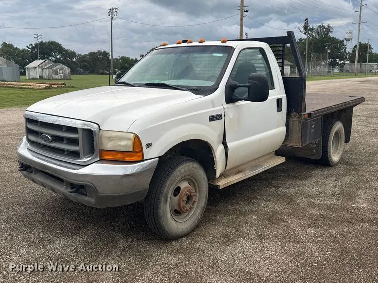 1999 Ford F350 flatbed pickup truck