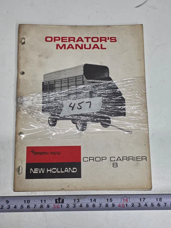 (2) New Holland Operator’s Manuals - Crop Carrier 8 & 351 Grinder-Mixer