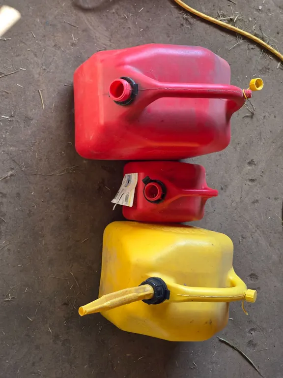 *OFFSITE* (2) Gas Cans, Half-Full Diesel Can