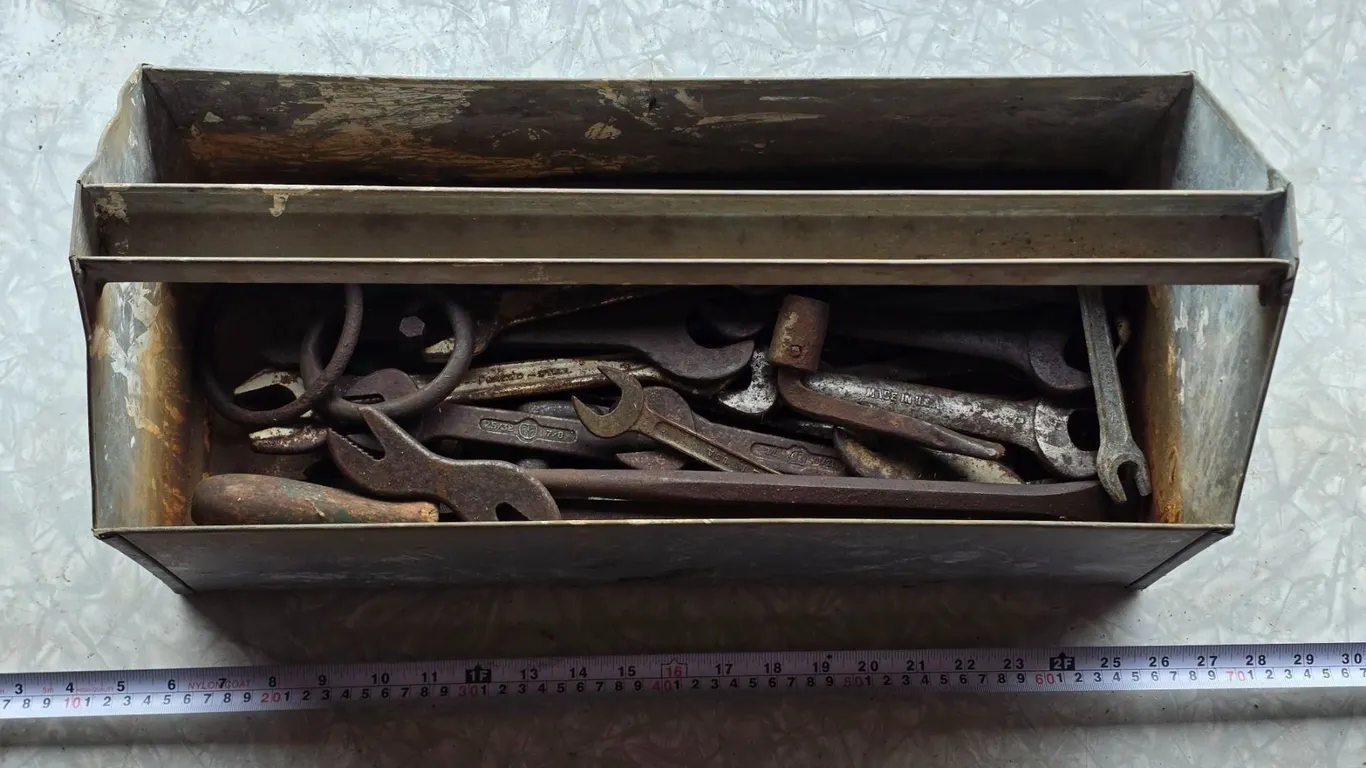 Tool box with antique wrenches