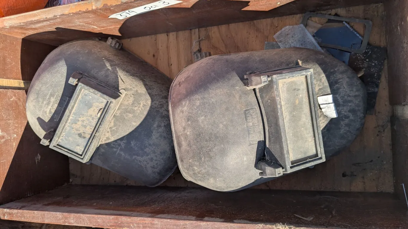 2 vintage welding masks with extra lenses