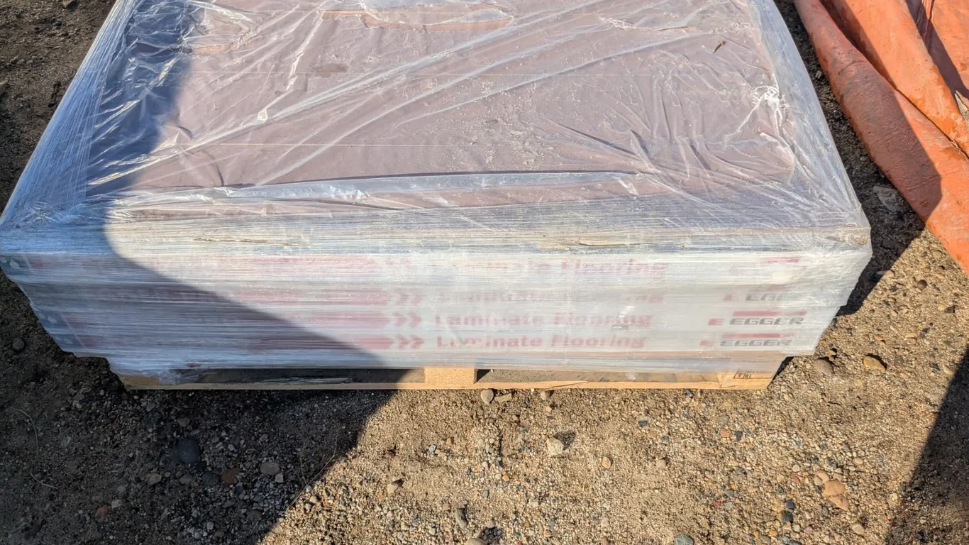 (16) Boxes Matching Laminate Flooring