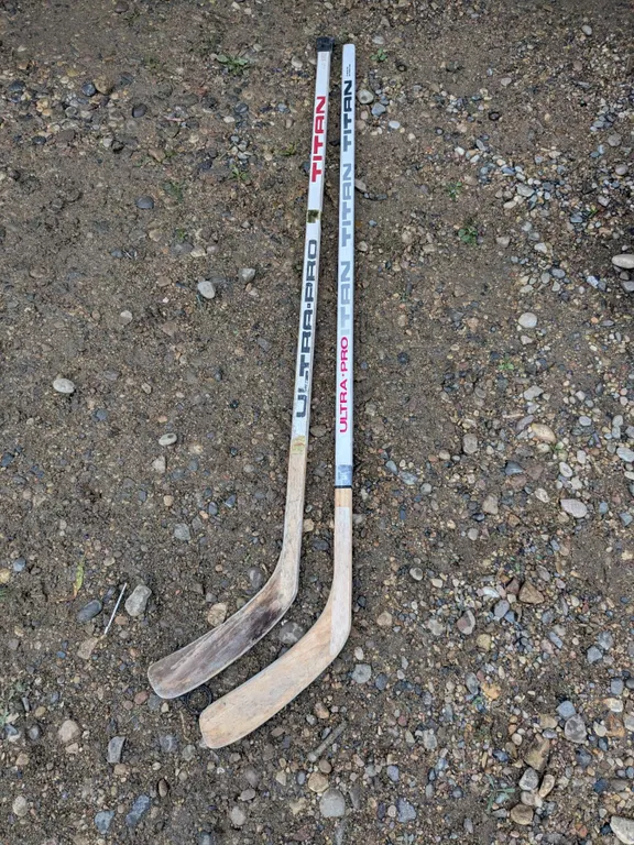 (2) Titan Hockey Sticks