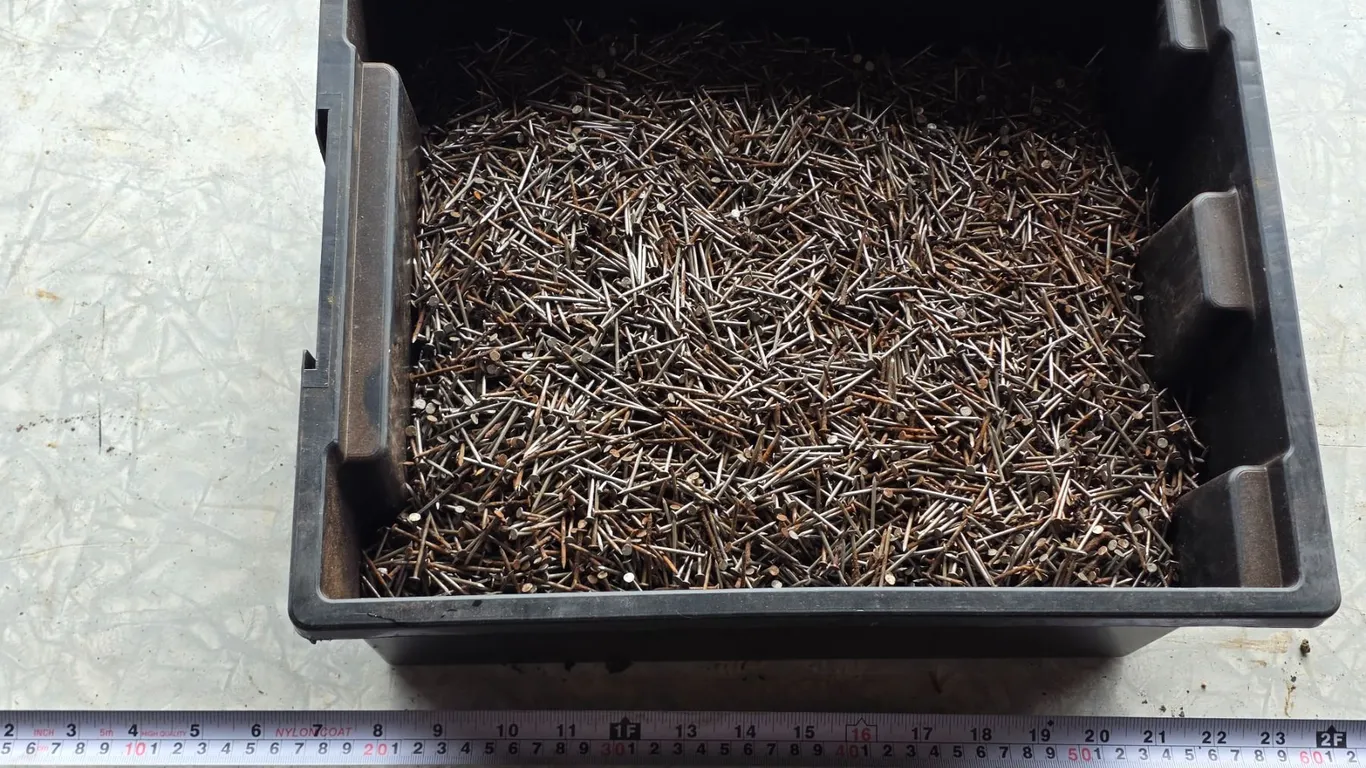 Bucket of finishing nails