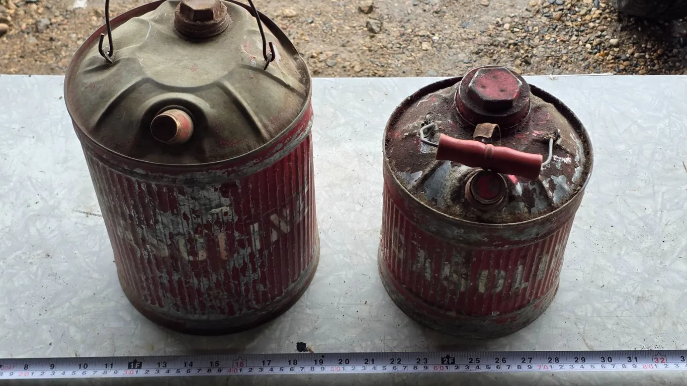 2 vintage gas cans
