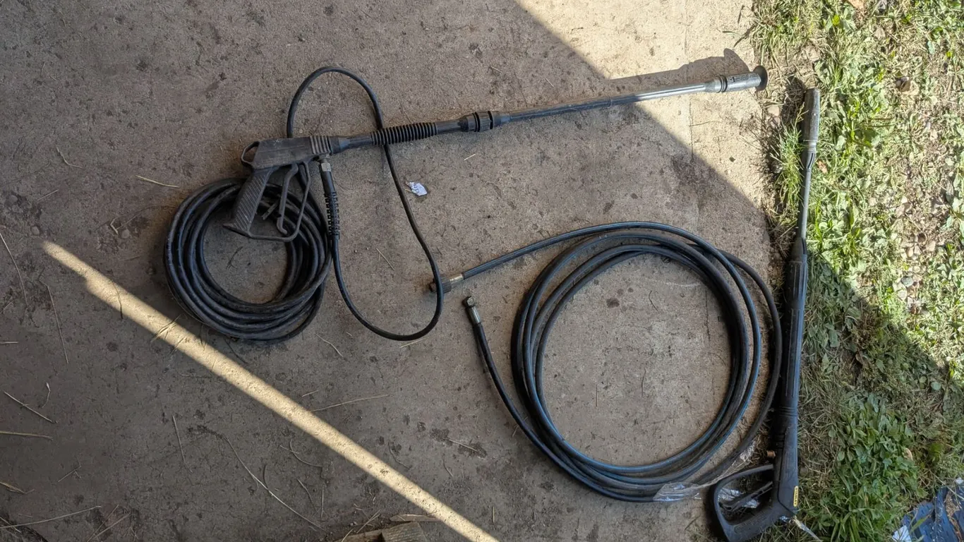 2 pressure washer wands with hoses