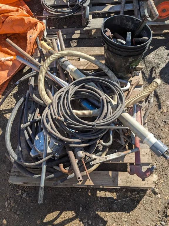 Pallet of misc items- hoses, broken hand fuel pumps