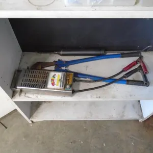 Bolt Cutters; Battery Tester; Misc Screws; Cow Bells; Cow Kickers; “Structo Dumper” Metal Toy Truck