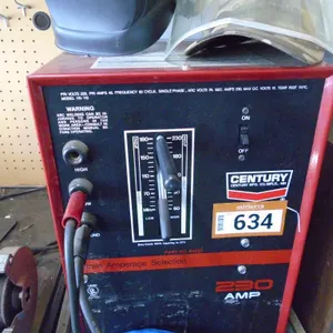 Century AC Welder 230 amp.  Model 110-110; Welding Helmet; Qty. Rods; Gloves on Rolling Stand