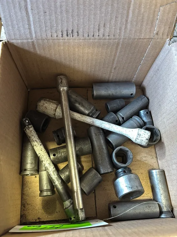 Assortment of 1/2" Drive Extensions and Shallow and Deep Impact Sockets