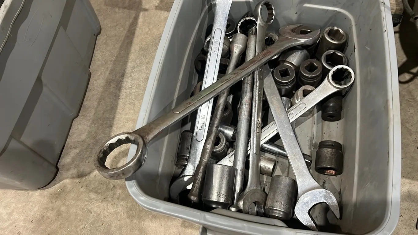 Plastic Tote of 3/4" Extensions 16" Combination Wrenches 1 1/16", 1 5/16", 1 1/2", 1 7/8" Large Assortment of 3/4" and 1" Impact Sockets Various Sizes