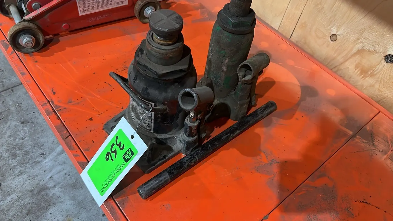 (1) 20 Ton Bottle Jack and (1) Approximately 5 Ton Bottles Jack