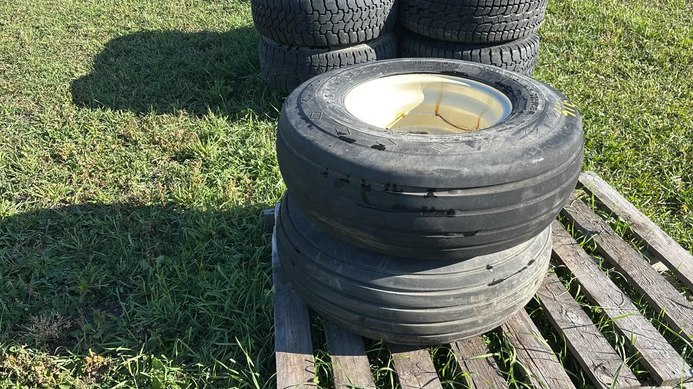 (2) Goodyear 11L - 15Fl Load Range F Implement Tires on Rims