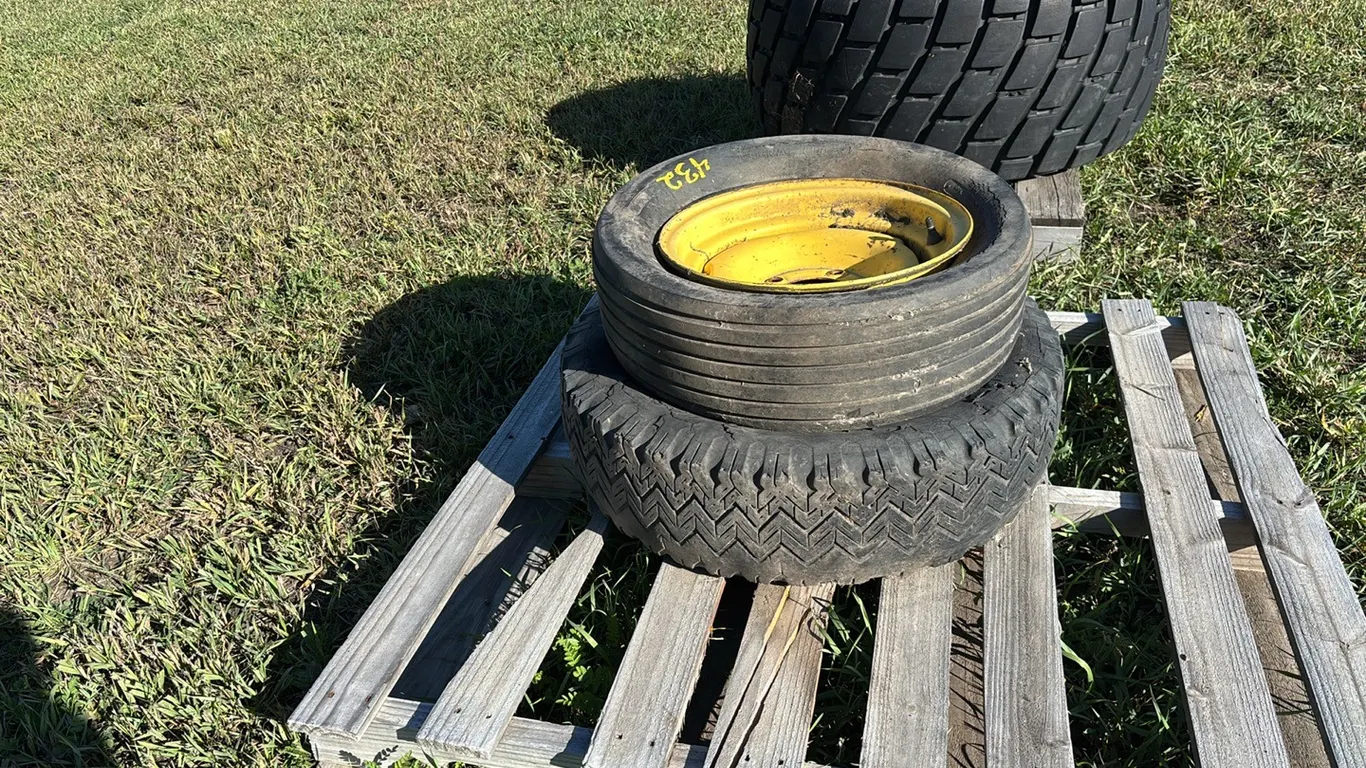 (2) 15" 4 Bolt Implement Rims *Tires are Damaged*